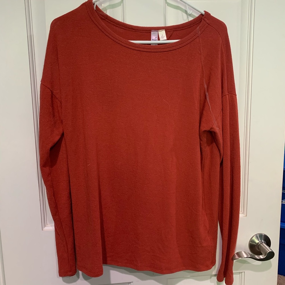 Worn once . Supper cute open back long sleeve